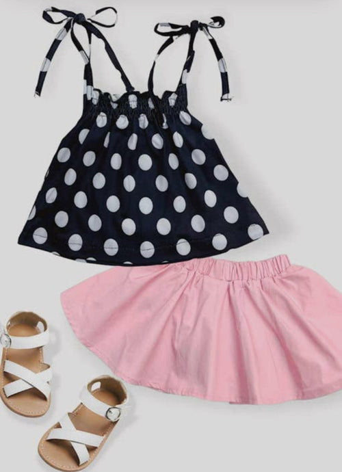 White polka dot on printed top with pink